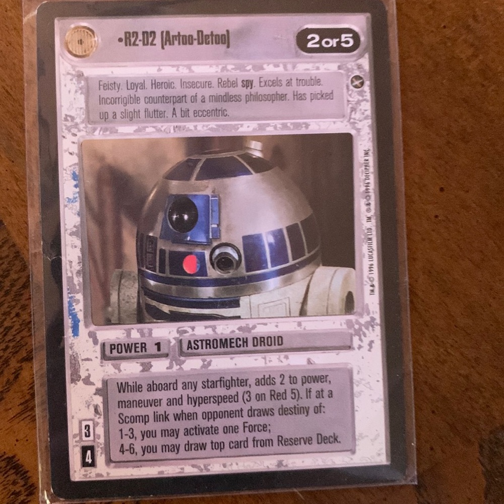 It is a R2-D2 card really rare and it is the original card made in 1996